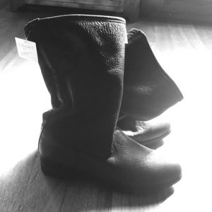 Anthropologie black leather fur lined boots